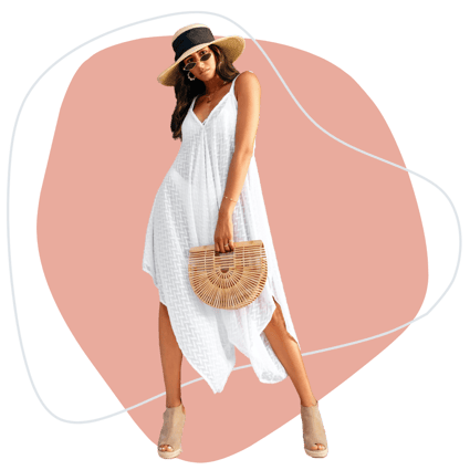 Trendy woman with rattan purse and straw hat wearing white dress for the ShopHopper Blog 